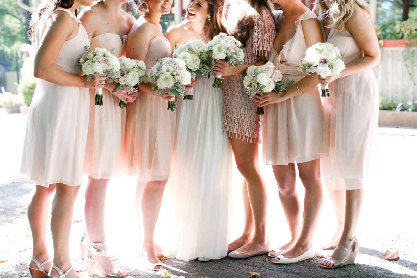 bridesmaids in pale pink dresses