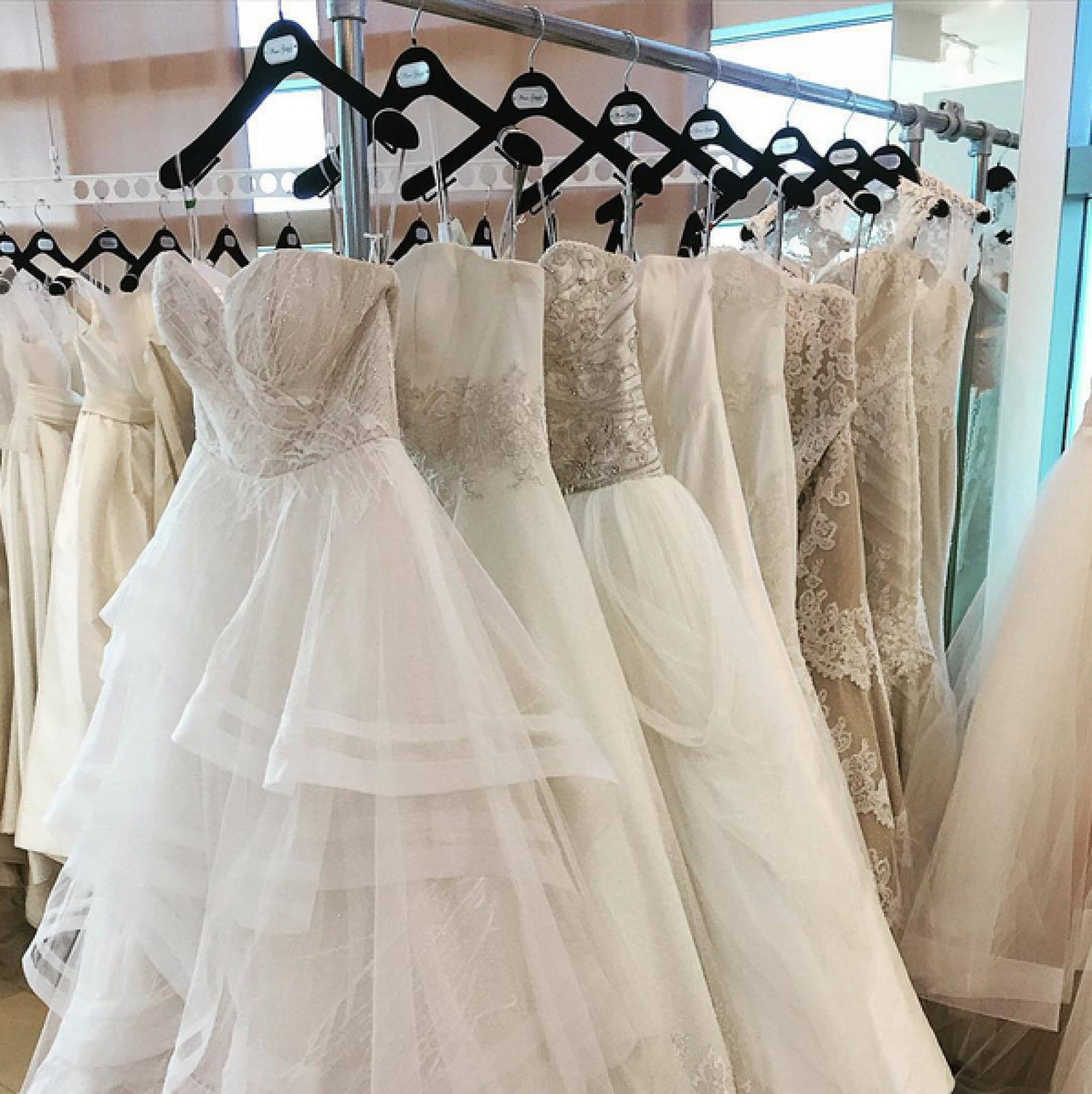 racks of bridal gowns