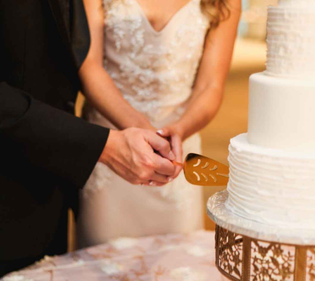 couple cutting cake
