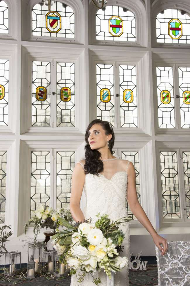 Bride in Front of Stained Glass Windows