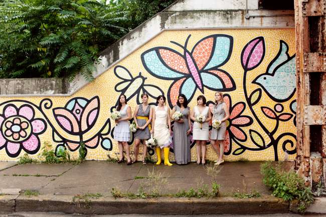 Mismatched Bridesmaids in Front of Bright Mural