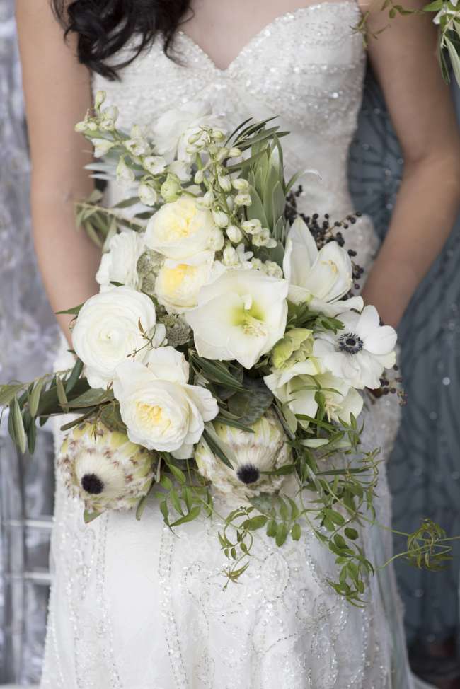 Bride Holding White Bouquet