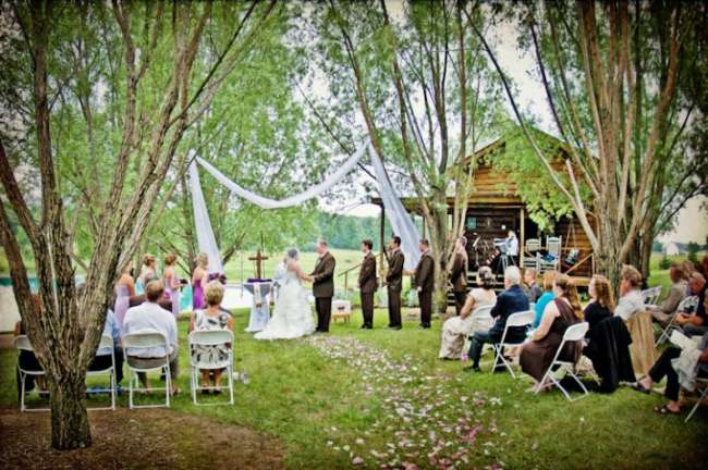 Outdoor Ceremony Under Fabric Archway