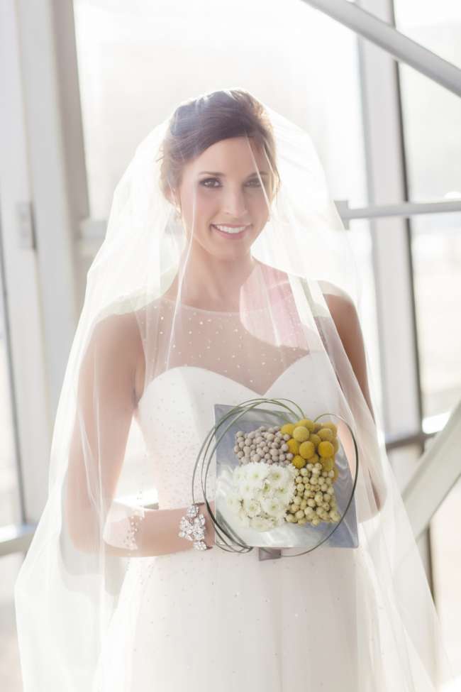 Bride Holding Modern, Abstract Bouquet
