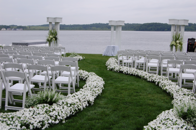 Aisle Lined With Flowers at Outdoor Ceremony 