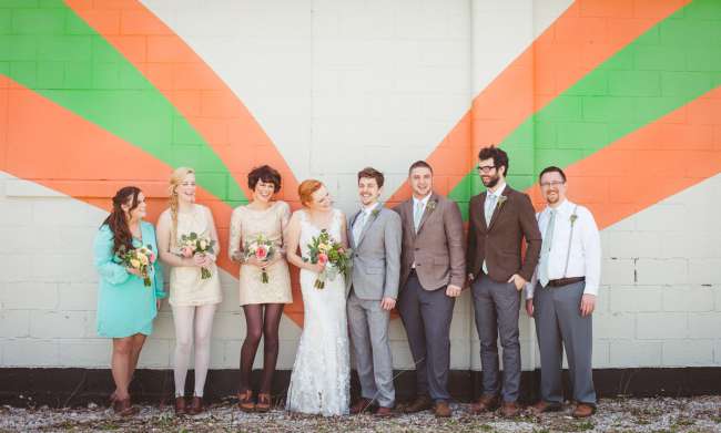 Mismatched Wedding Party in Front of Bold Wall