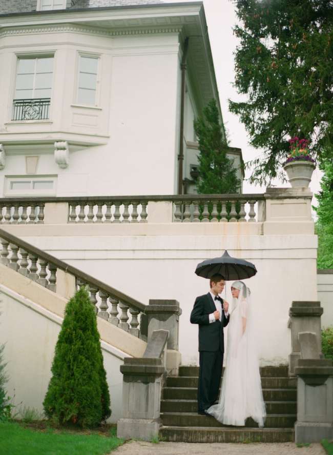 Bride and groom outside museum