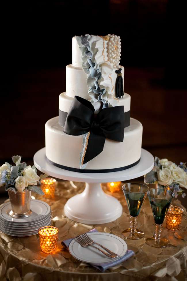 4-Tiered Cake With Frosting Ruffles & Large Bow