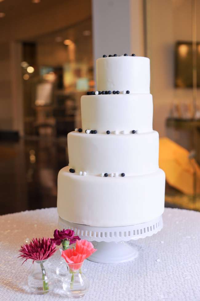 Asymmetrical White Cake With Black Accents