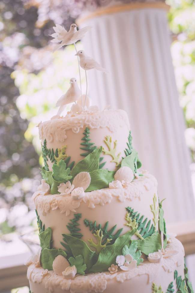 White Cake With Edible Leaves & Dove Topper
