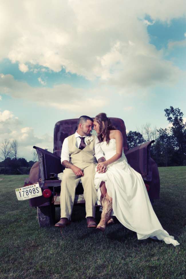 Bride & Groom Sitting in the Bed of a Truck