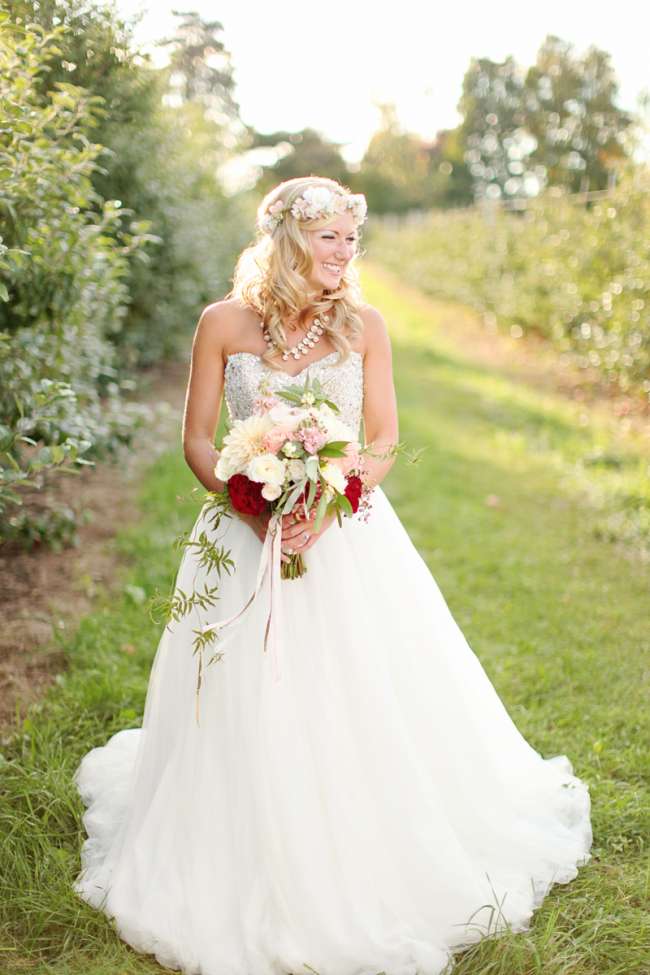 Bride Holding a White, Pink & Red Boquet