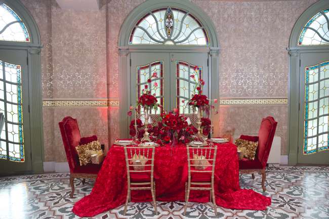 Red linens and flowers