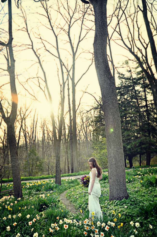 Bride walking through woods