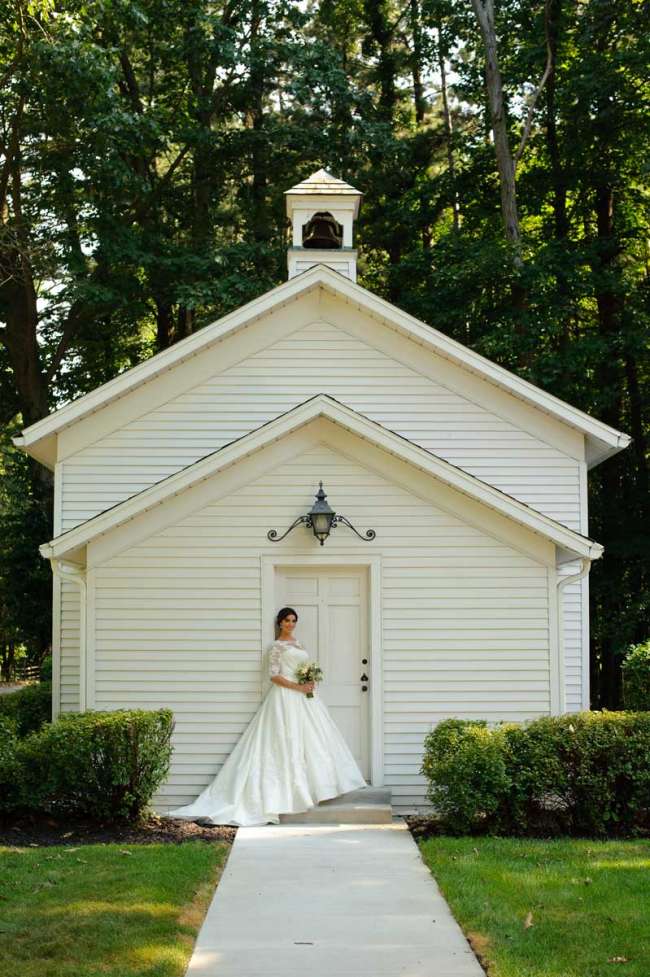 Bride in front of church