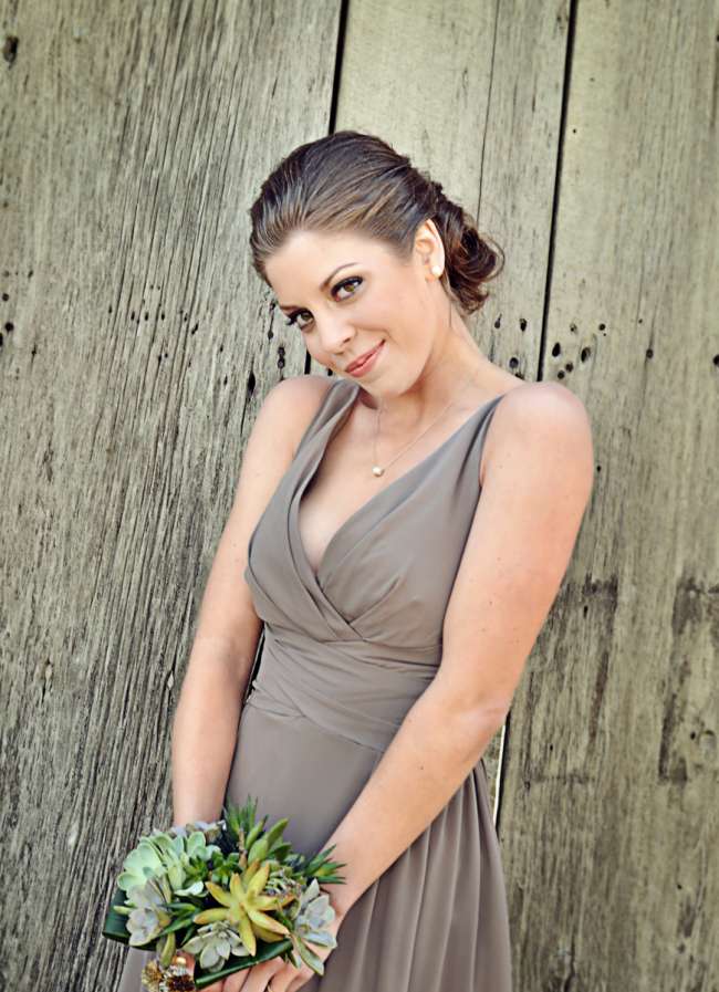 Bridesmaid Holding a Bouquet of Succulents