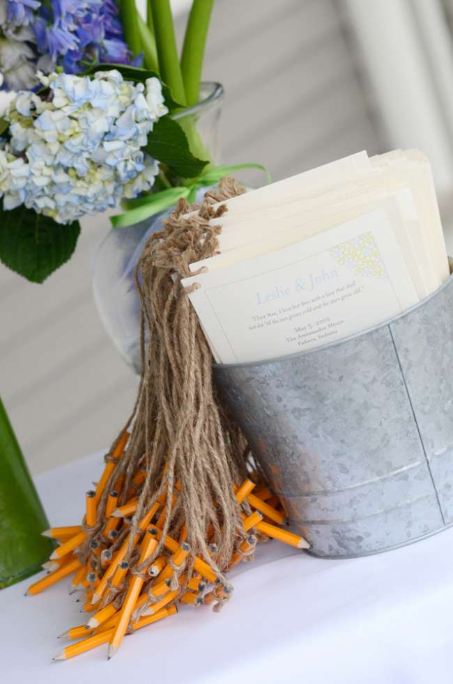 Pencils Tied to Wedding Programs With Twine