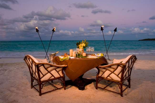 Romantic dinner for two on the beach
