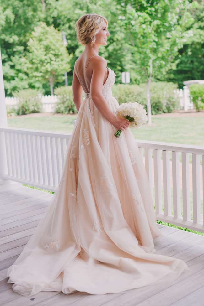 Radiant Bride With Relaxed Curls in Blush Gown