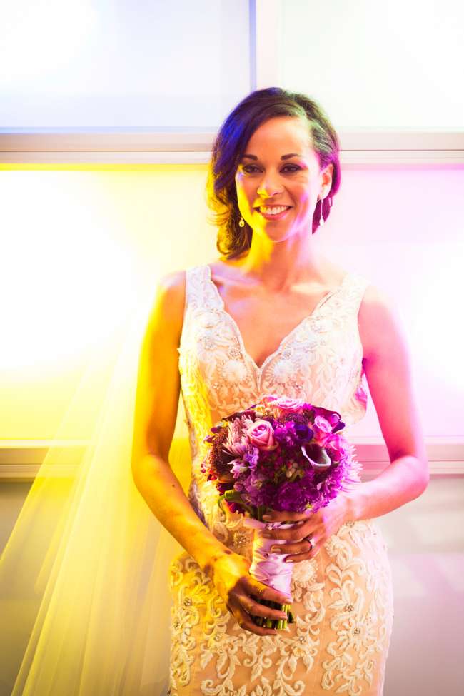 Bride Holding a Pink & Purple Bouquet