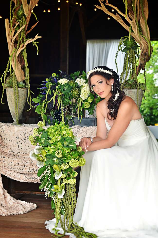 Romantic Bride Surrounded by Lush Greenery