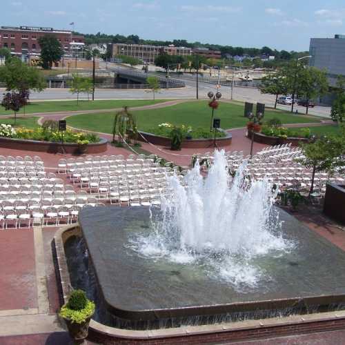 Outdoor wedding ceremony by fountain at Jon R. Hunt Plaza in front of Morris Performing Arts Center