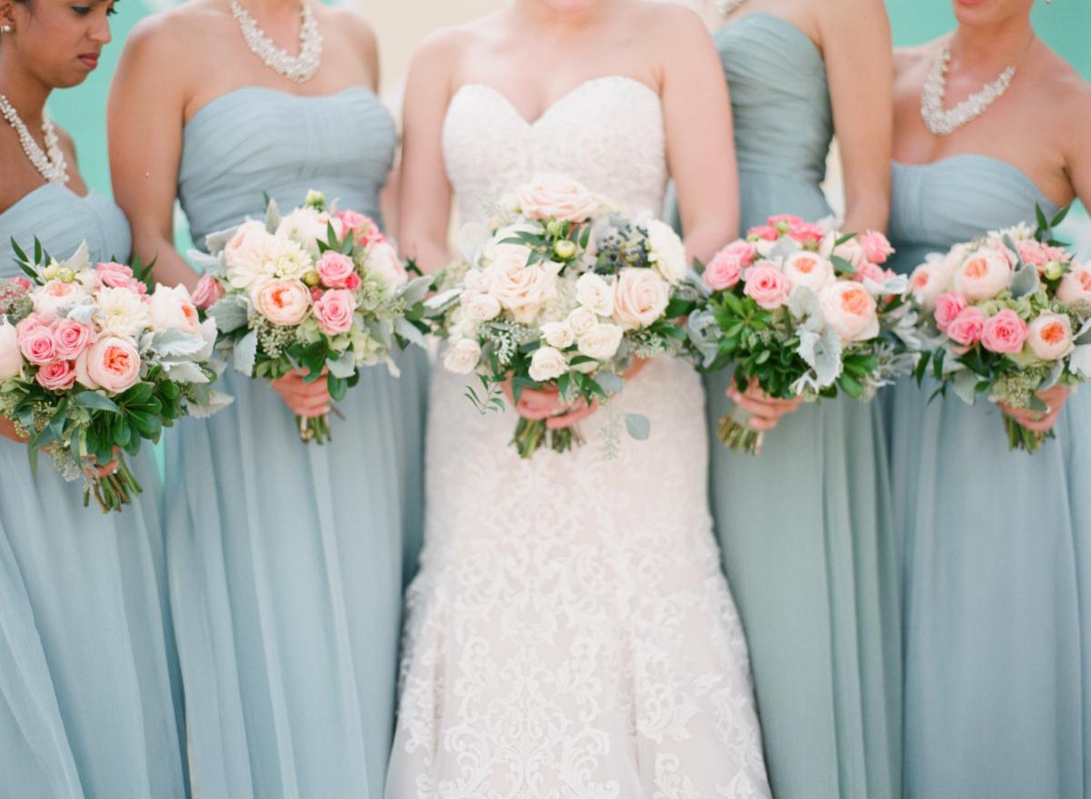 bridesmaids holding bouquets