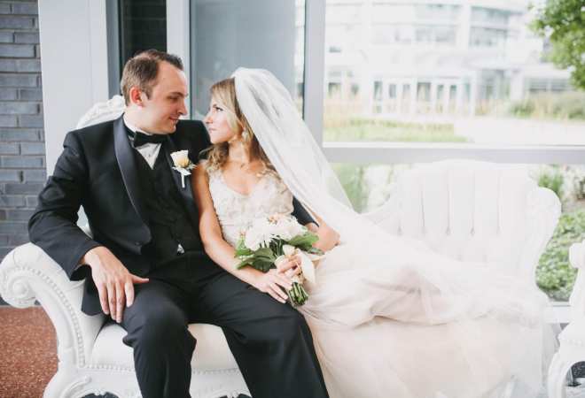 couple embracing on love seat