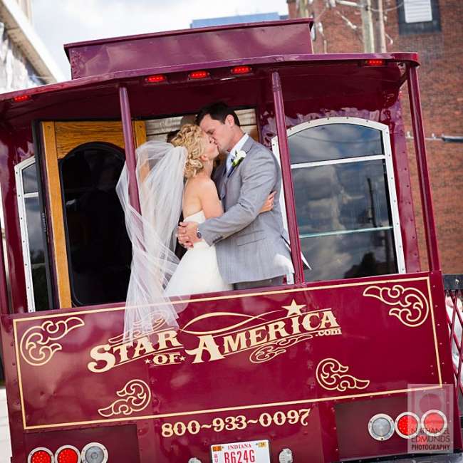 Bride & Groom Share a Kiss on a Trolley