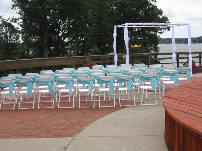 Turquoise Chair Covers at Outdoor Ceremony