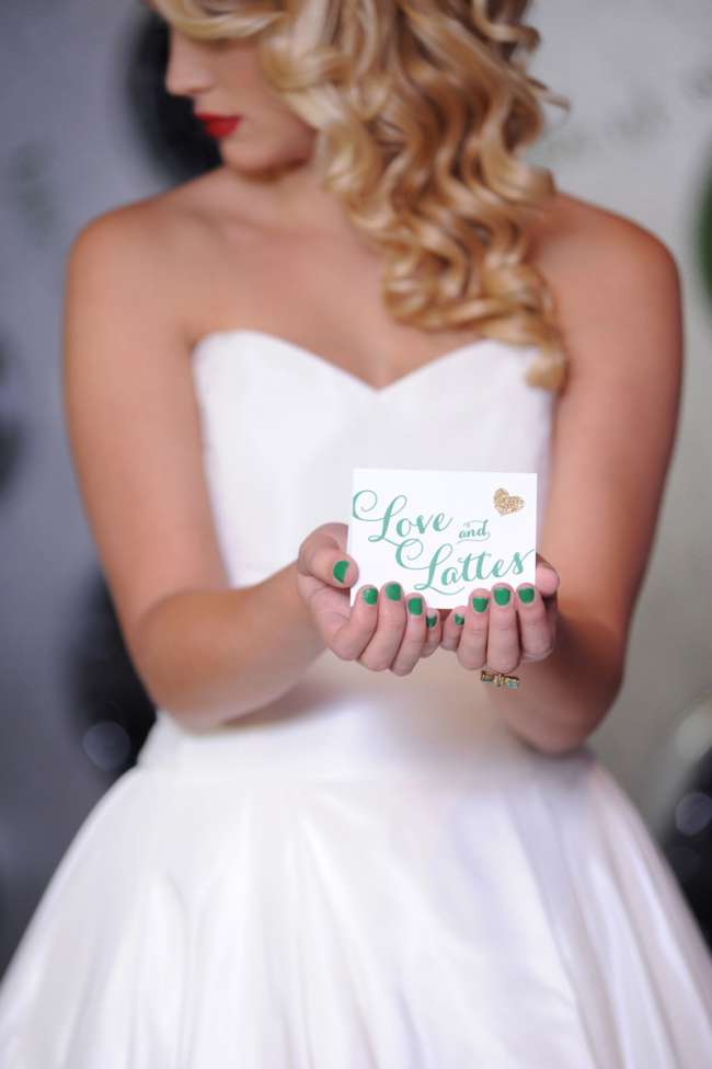 Bride Holding "Love and Lattes" Sign