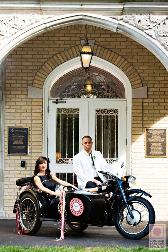 Bride and groom with motorcycle