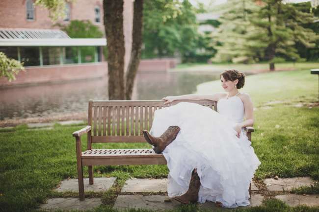 Bride in Essence of Australia Gown & Cowgirl Boots