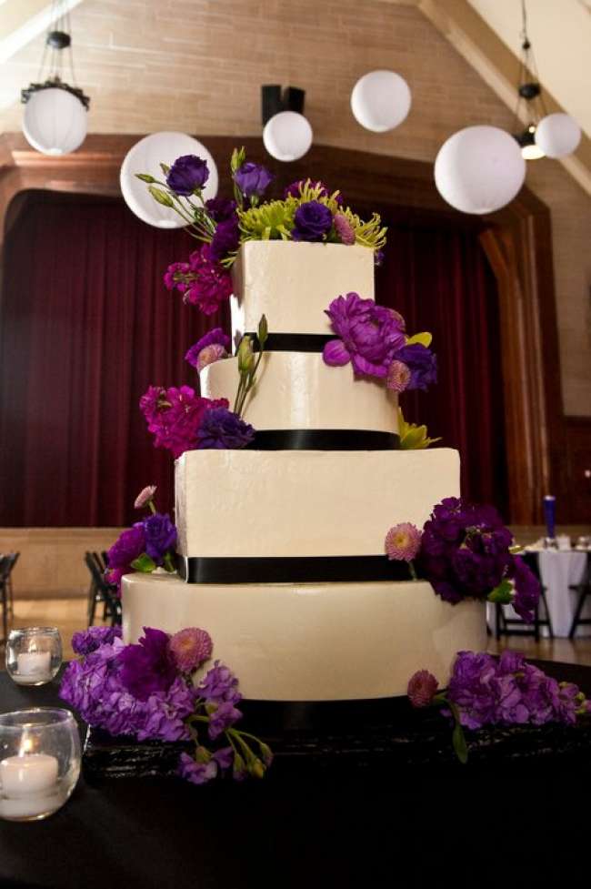 Four-TIered Cake with Purple Flowers
