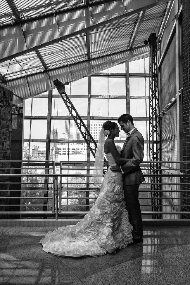 Bride and groom in industrial setting