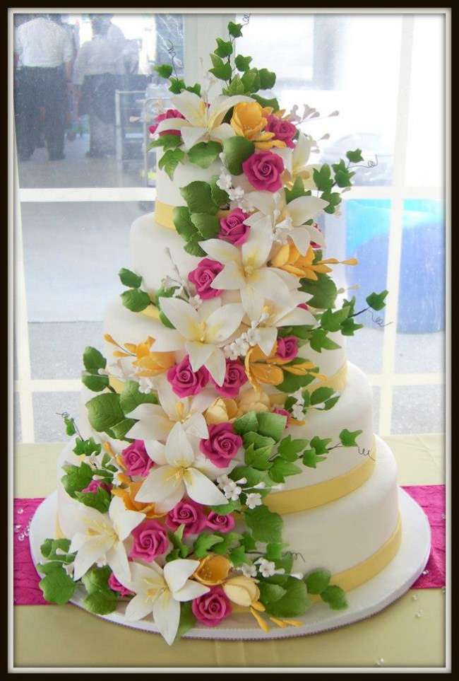 Sugar flowers accenting wedding cake