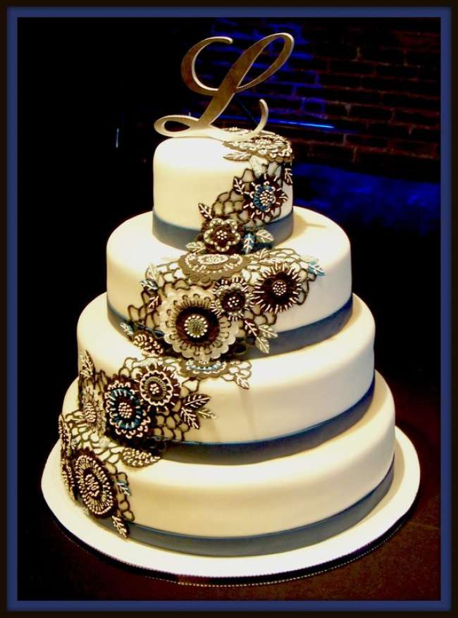 Edible decor incorporated onto wedding cake