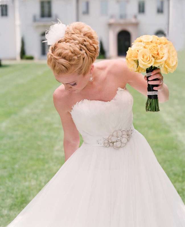 Bride with Updo Holding a Yellow Bouquet